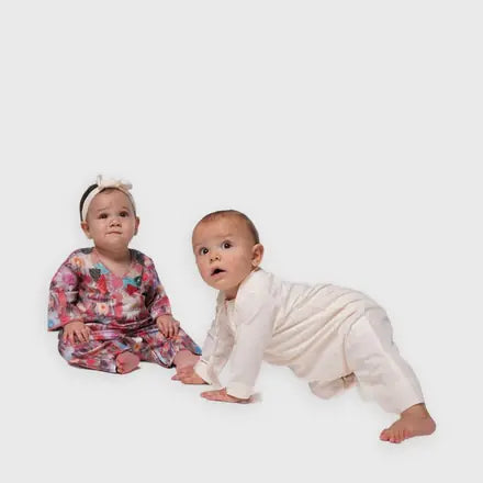 Two babies in a jalabiya onesie and a kandora onesie